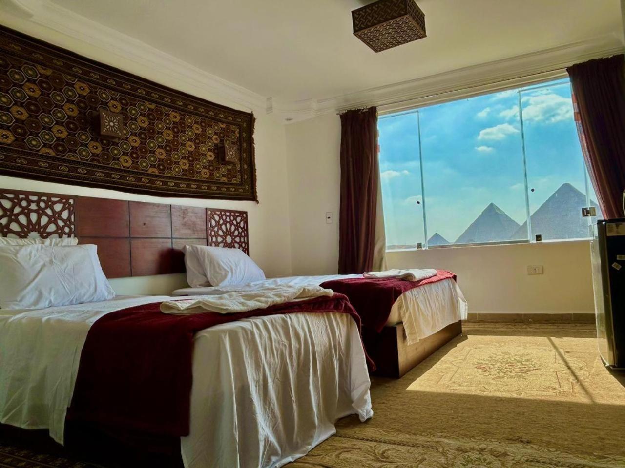 Oscar Pyramids View Hotell Nazlet el-Sîsi Rum bild