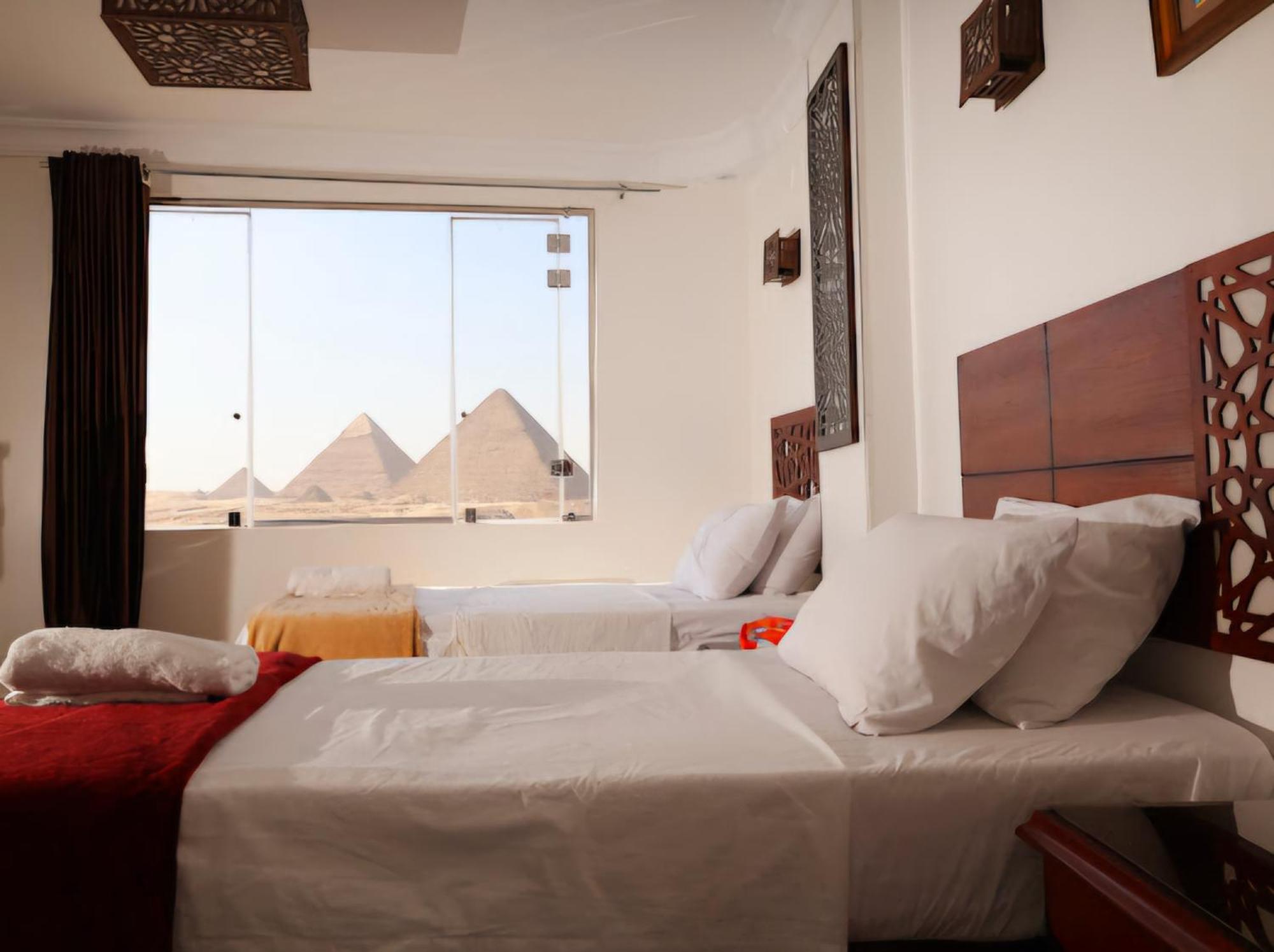 Oscar Pyramids View Hotell Nazlet el-Sîsi Rum bild